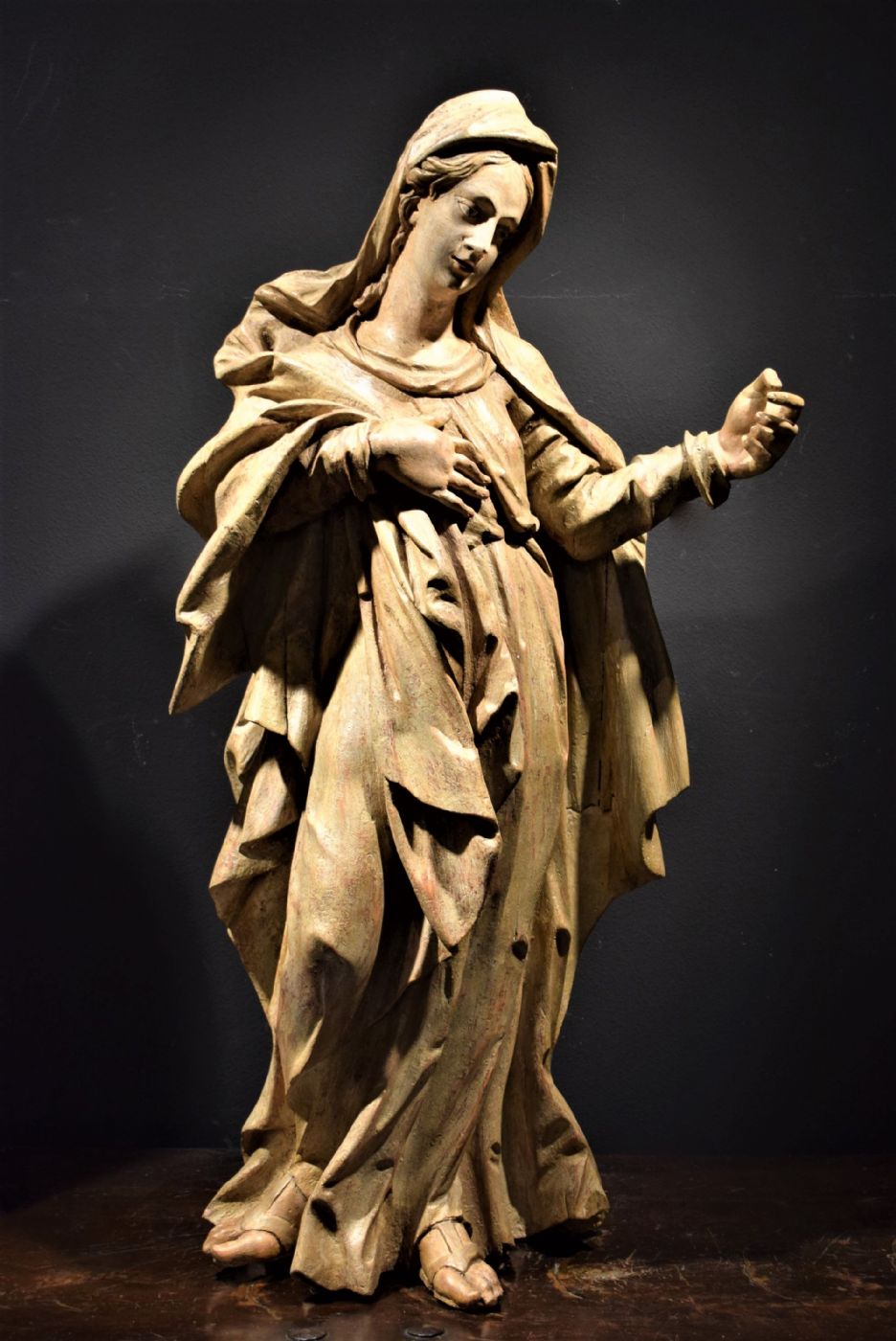 Madonna. Lacquered wooden sculpture in imitation marble.